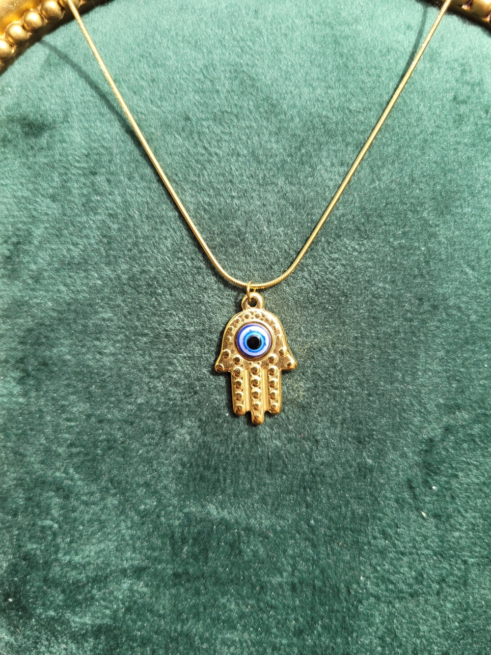 Gold Hamsa Hand Necklace with Blue Evil Eye